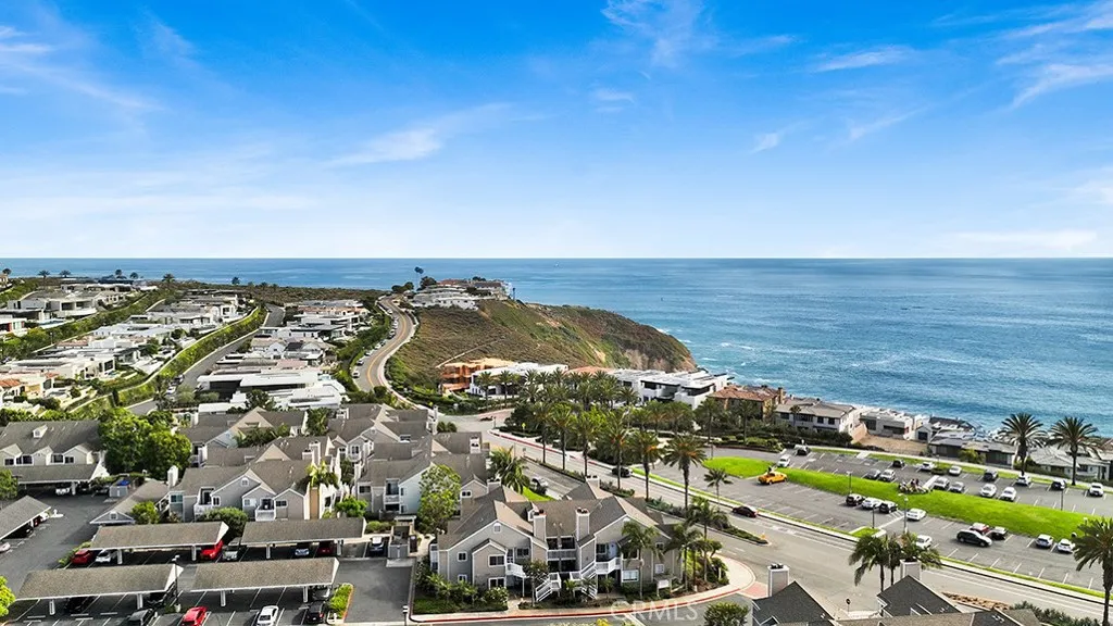 34040 Selva Road, Unit 127 Dana Point, CA 92629 - Photo 5 of 26 Peek a boo views of the ocean from kitchen window and doorway entering condo.