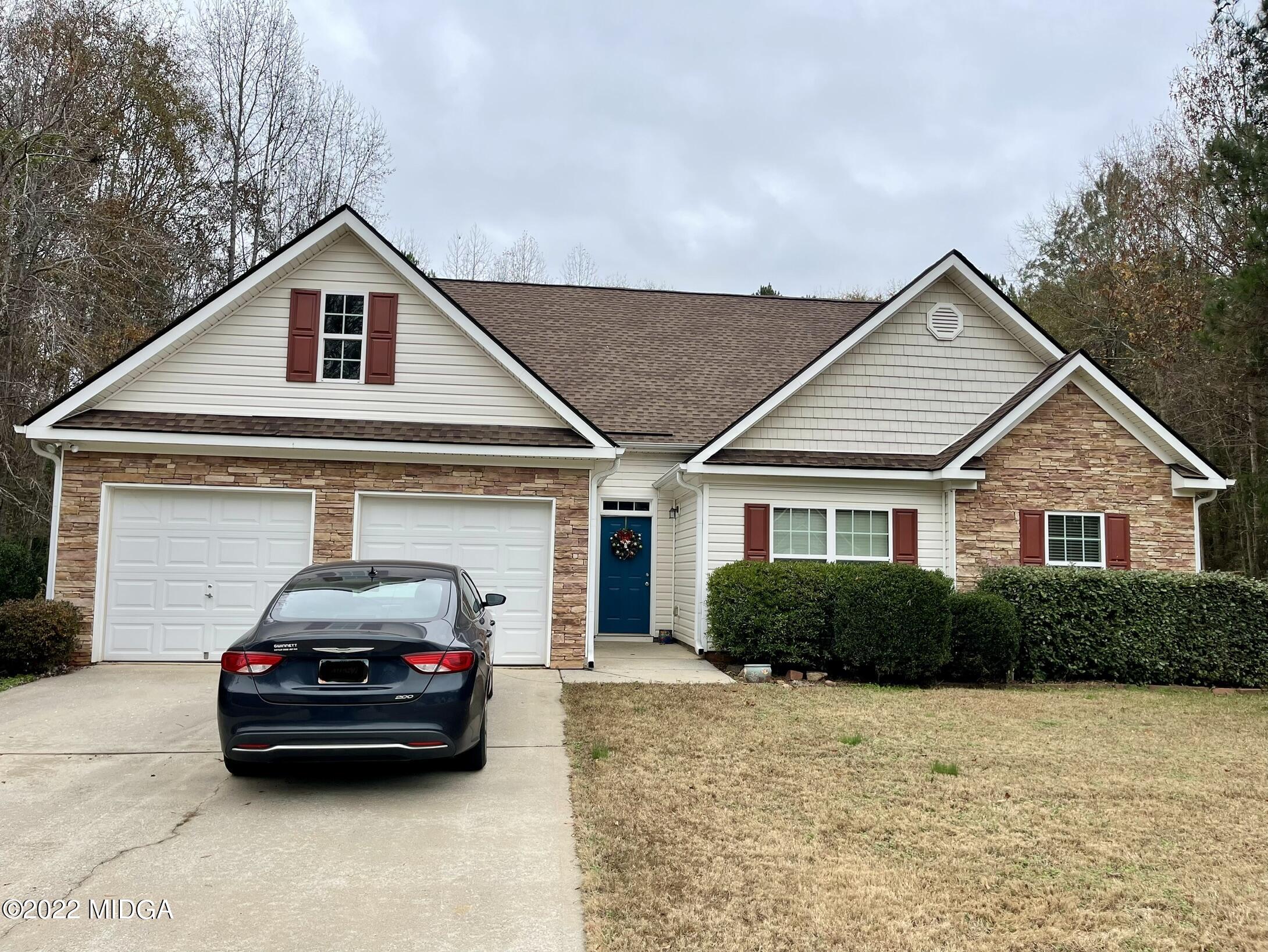 90 Hickory Road Jackson, GA 30233 - Photo 1 of 19 a view of a car in front of house