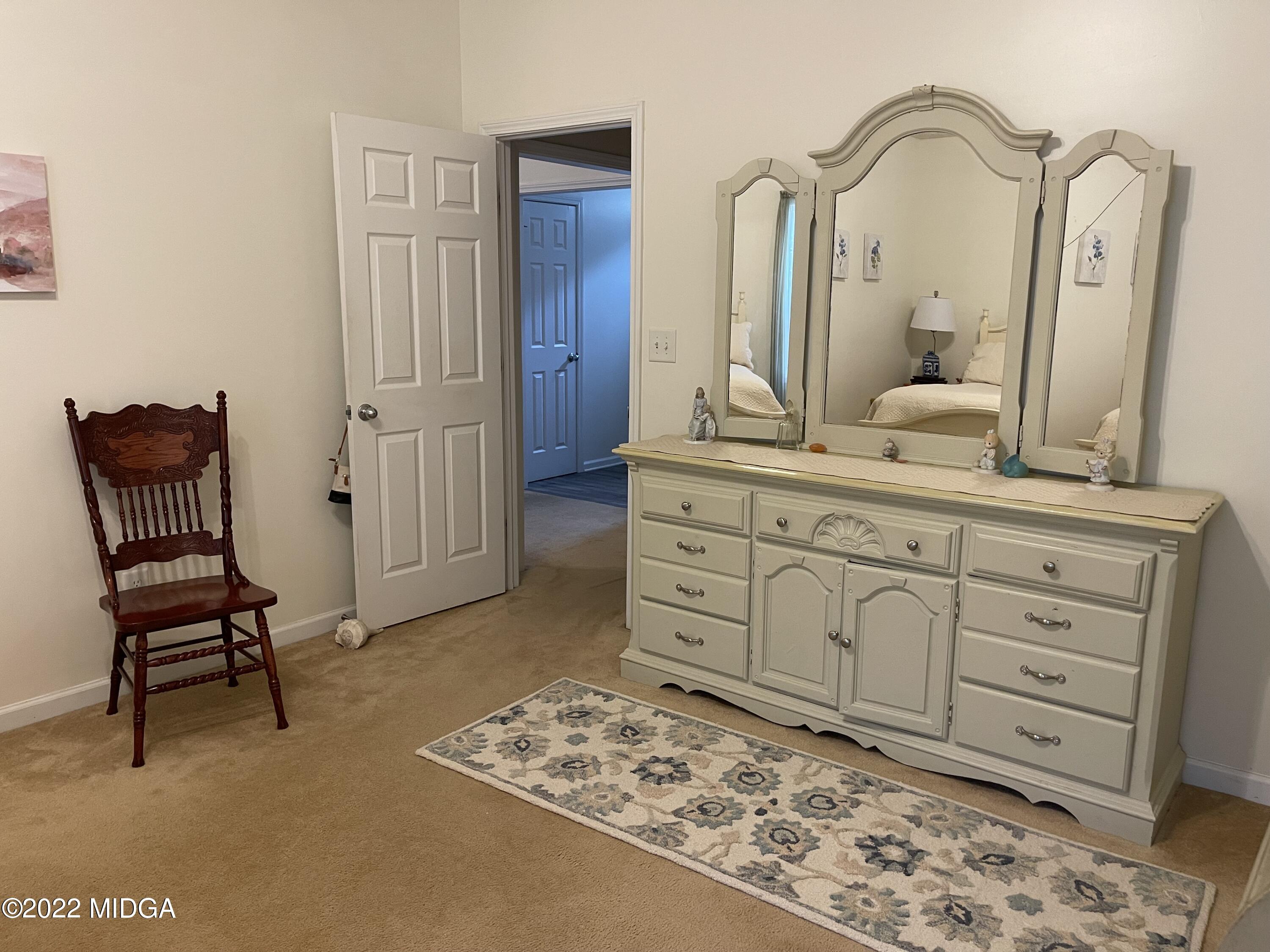 90 Hickory Road Jackson, GA 30233 - Photo 18 of 19 a view of a hallway with mirror and furniture
