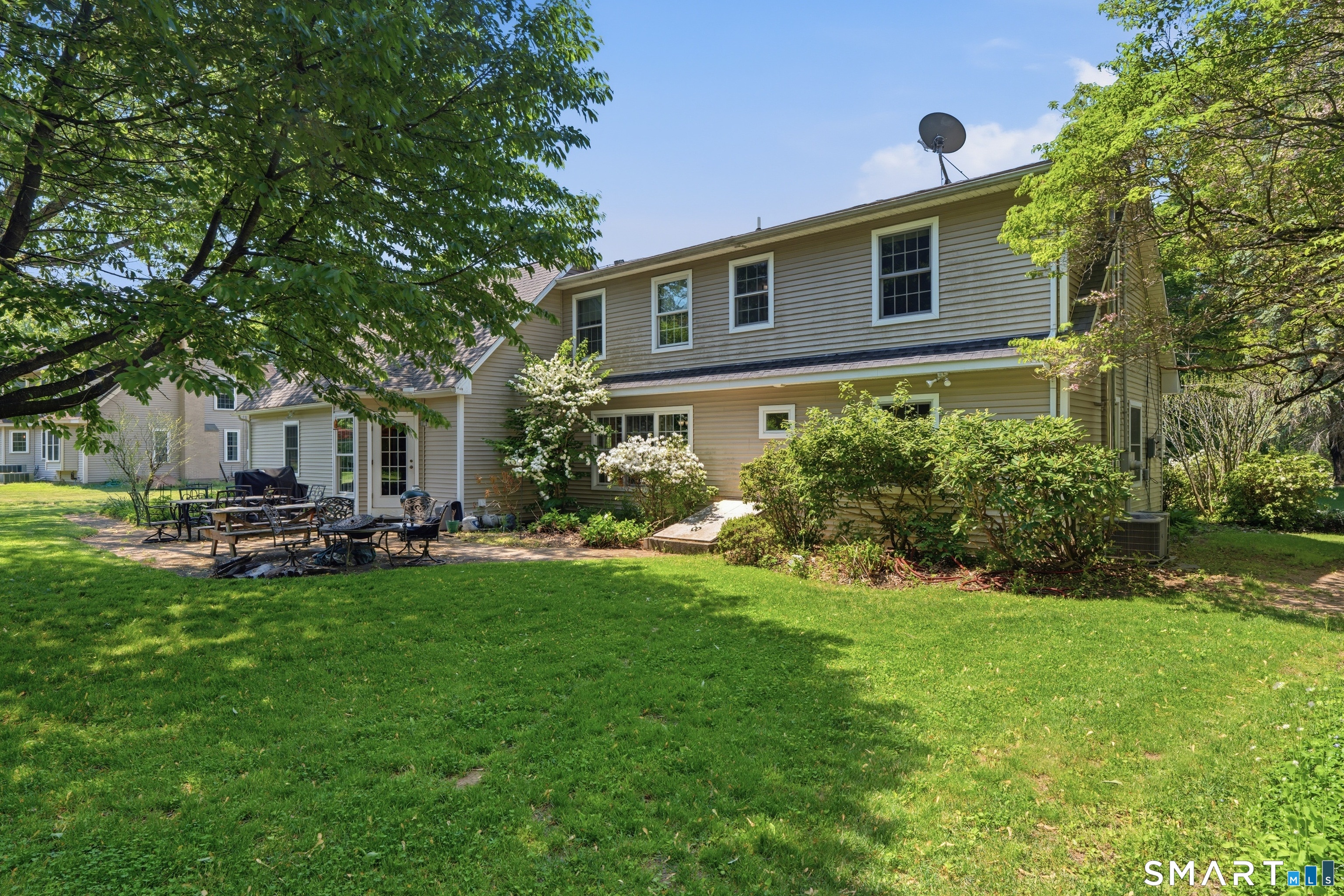 48 Case Road Burlington, CT 06013 - Photo 26 of 39 a view of a house with backyard sitting area and garden