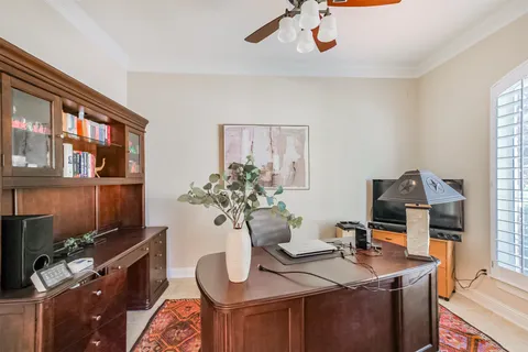 a view of a workspace with furniture