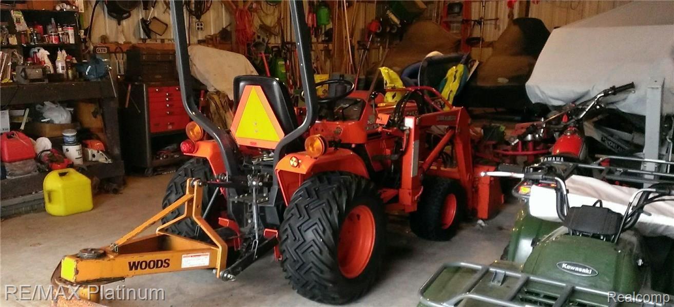 2085 West Wardlow Road Highland, MI 48357 - Photo 18 of 18 Warlow tractor.jpg