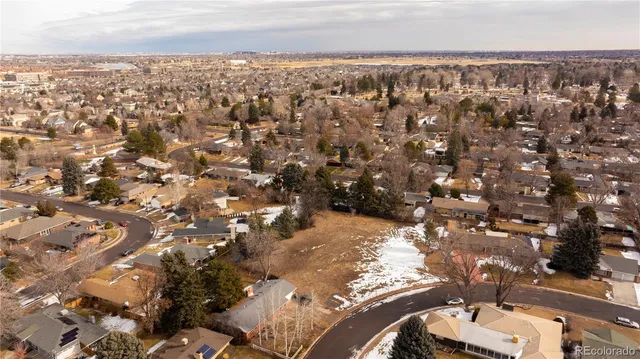 an aerial view of residential building with parking space