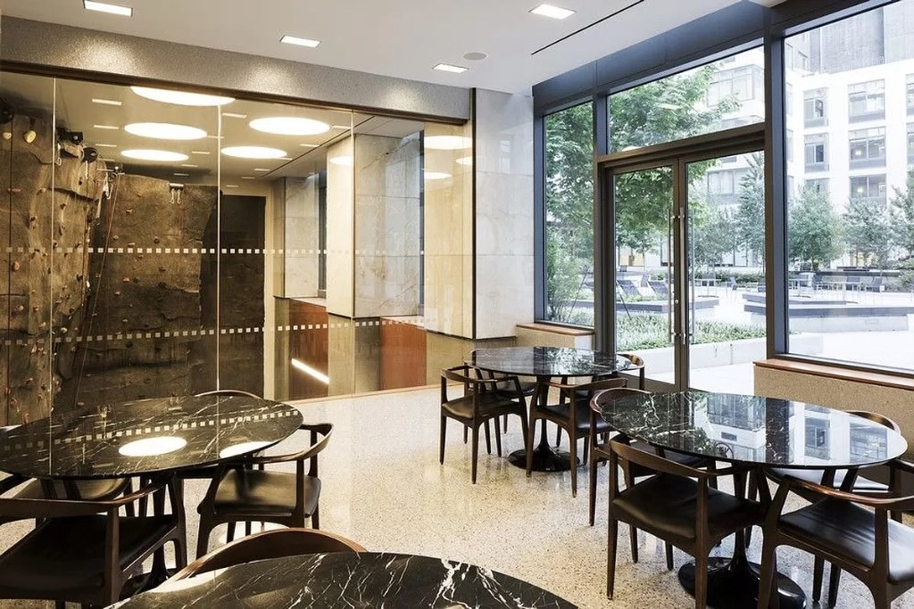 60 Riverside Boulevard, Unit 1707 Manhattan, NY 10069 - Photo 18 of 20 a view of a dining room with furniture window and outside view