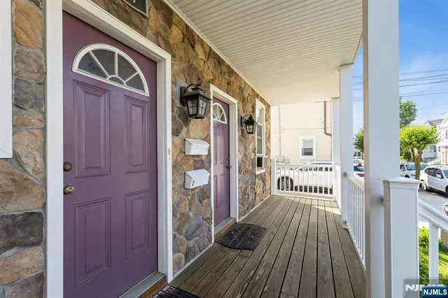 a front view of a house with a outdoor space