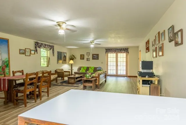 a view of a city and lush green forest
