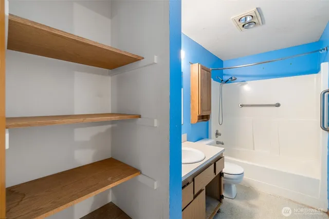 a bathroom with a sink a bathtub and a shower