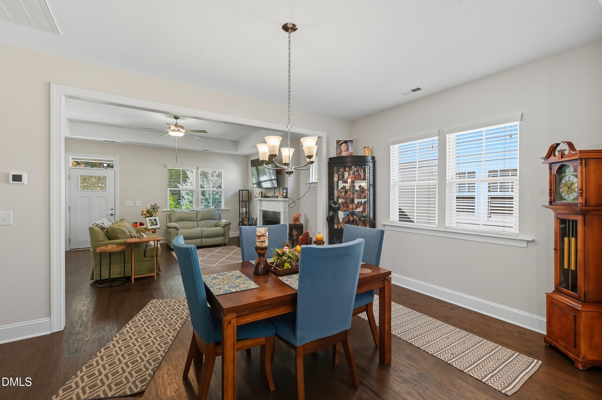 116 Beaufort Loop Clayton, NC 27520 - Photo 13 of 33 a view of a dining room with furniture