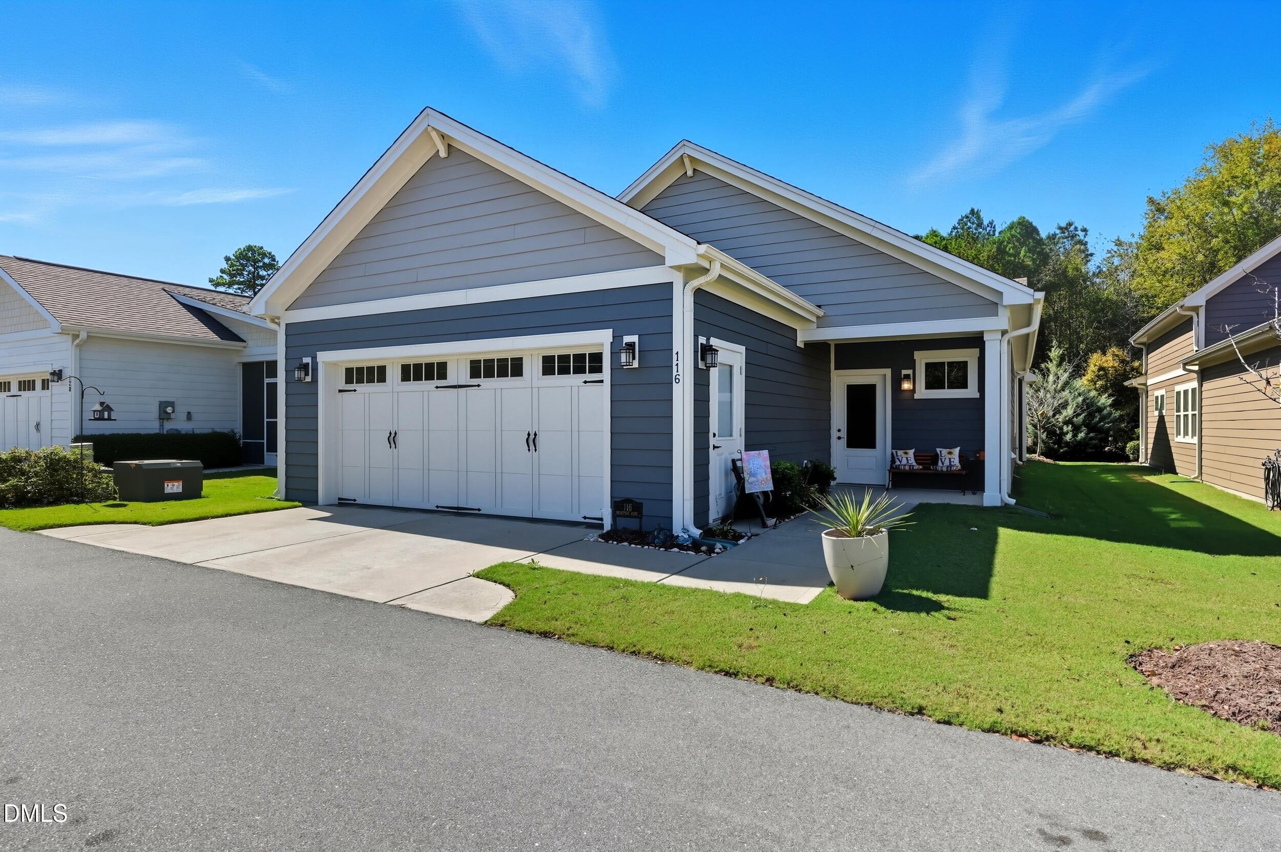 116 Beaufort Loop Clayton, NC 27520 - Photo 25 of 33 a view of a house with backyard and porch