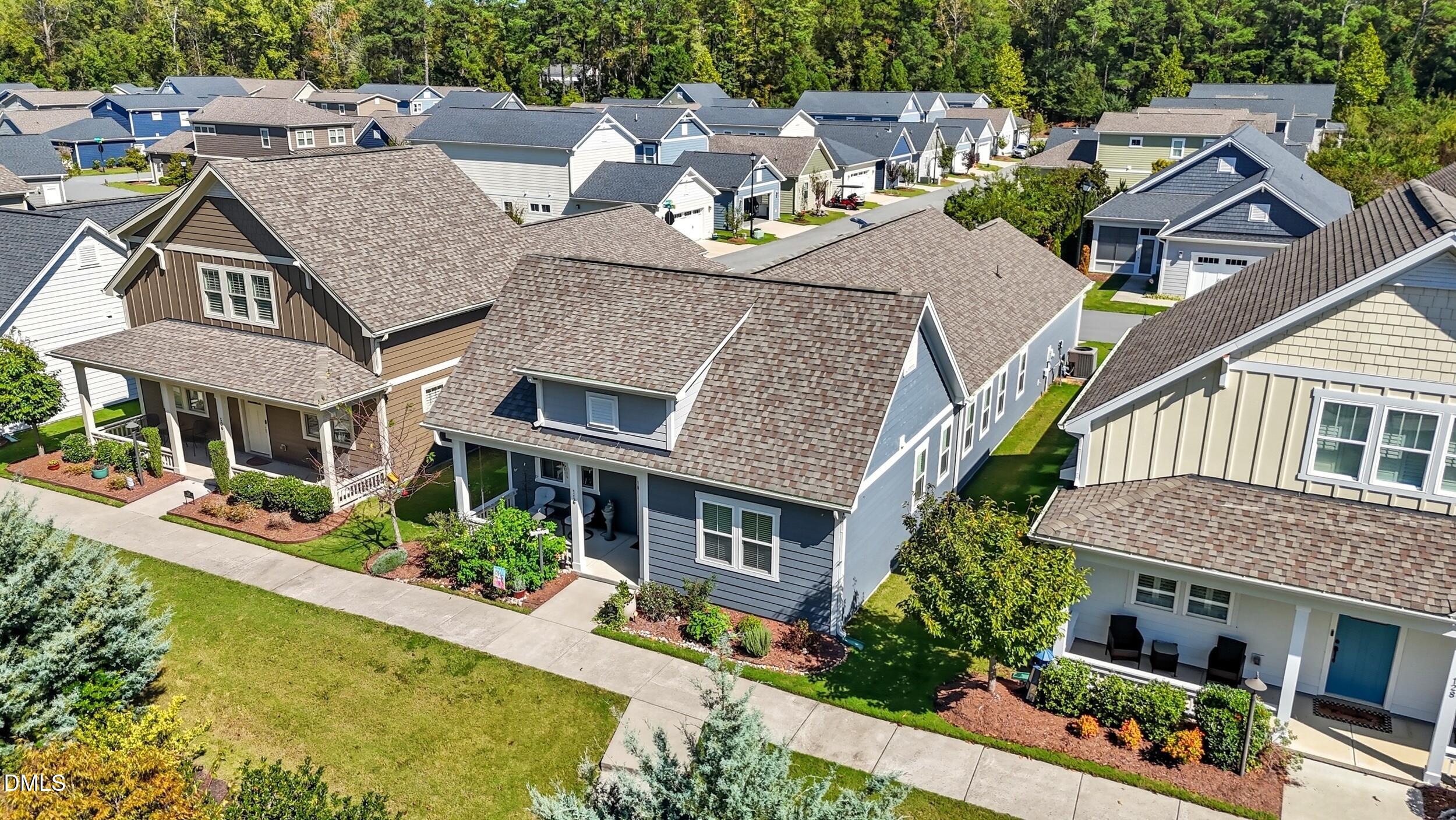 116 Beaufort Loop Clayton, NC 27520 - Photo 27 of 33 aerial view of multiple houses with a yard