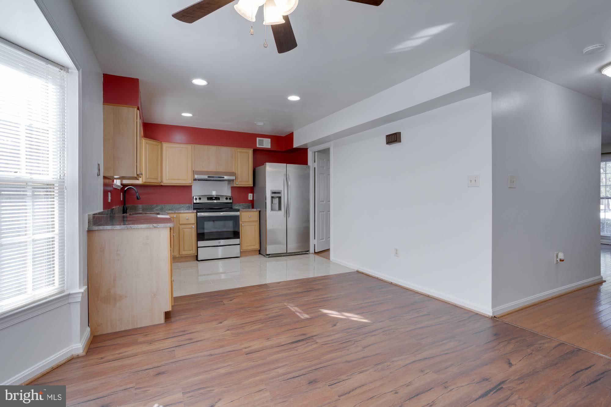 9043 Blarney Stone Drive Springfield, VA 22152 - Photo 11 of 23 a view of kitchen with refrigerator and microwave