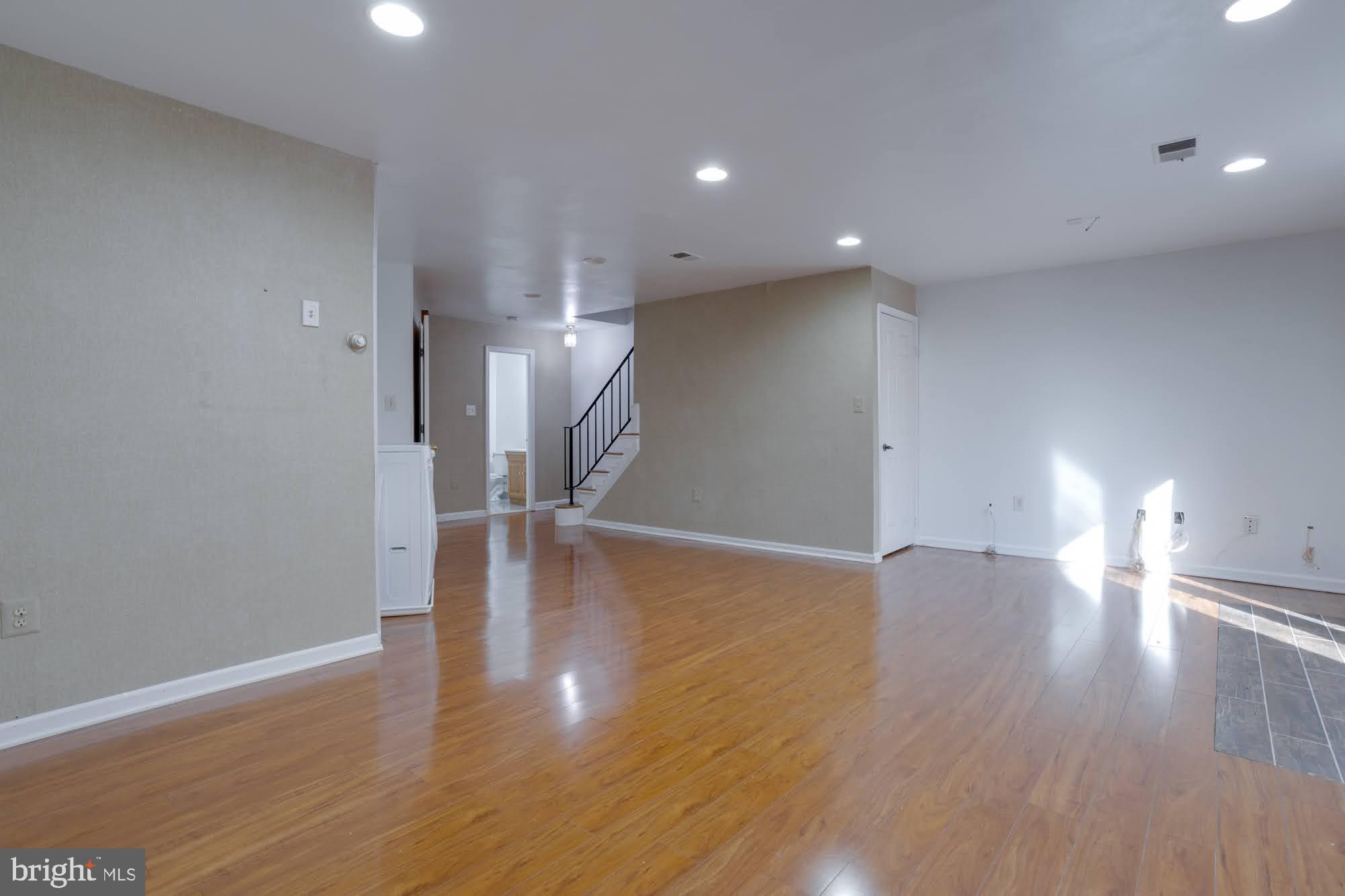 9043 Blarney Stone Drive Springfield, VA 22152 - Photo 21 of 23 a view of a room with wooden floor