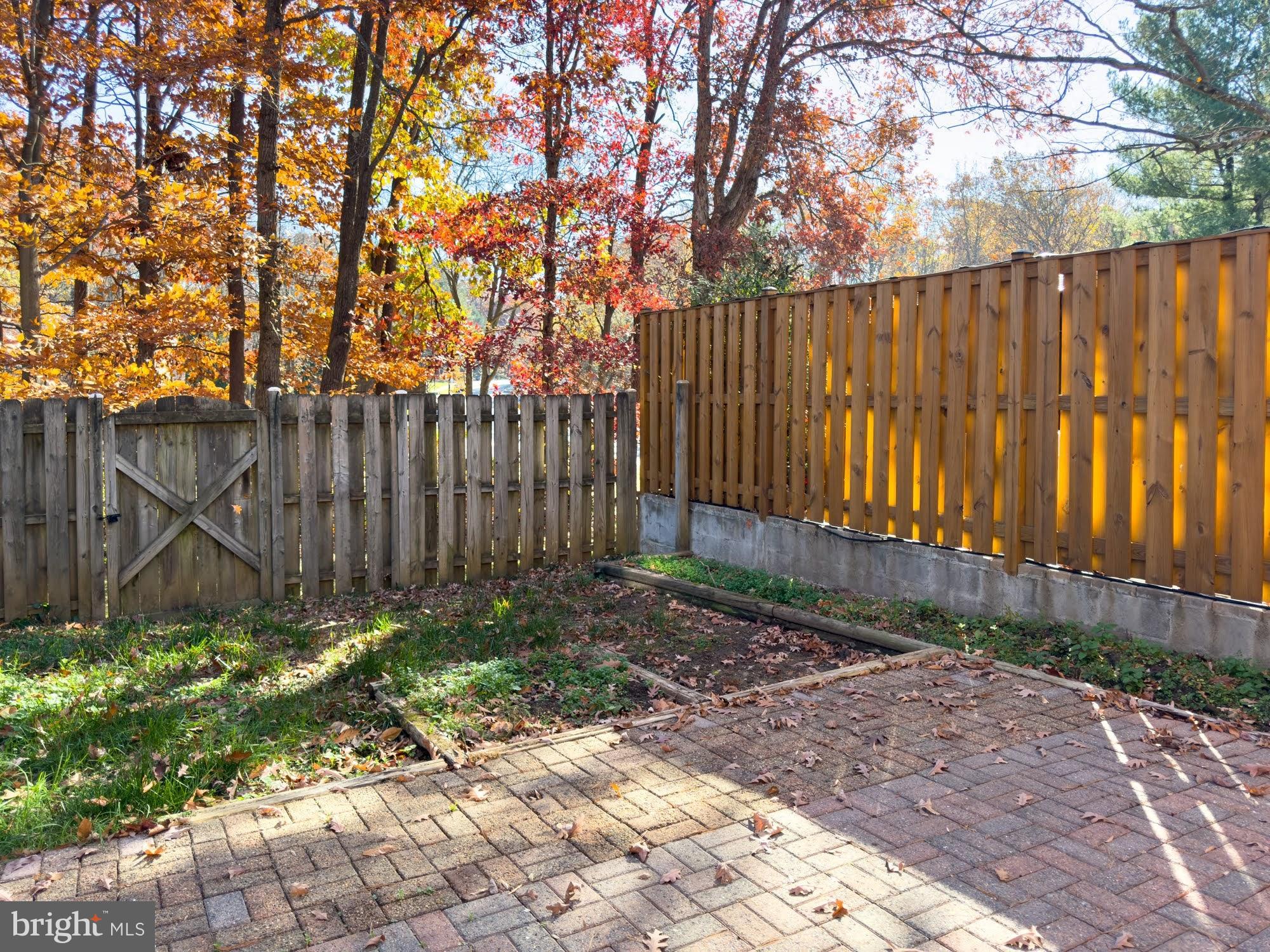 9043 Blarney Stone Drive Springfield, VA 22152 - Photo 3 of 23 a backyard of a house with lots of green space