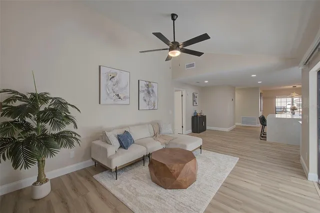 a bathroom with a granite countertop double vanity sinks and a mirror