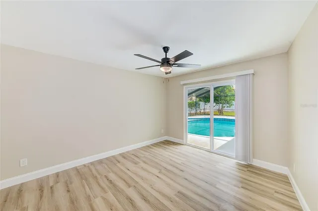 a dining room with furniture and outdoor view