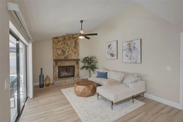 a bedroom with a bed and painting on the wall