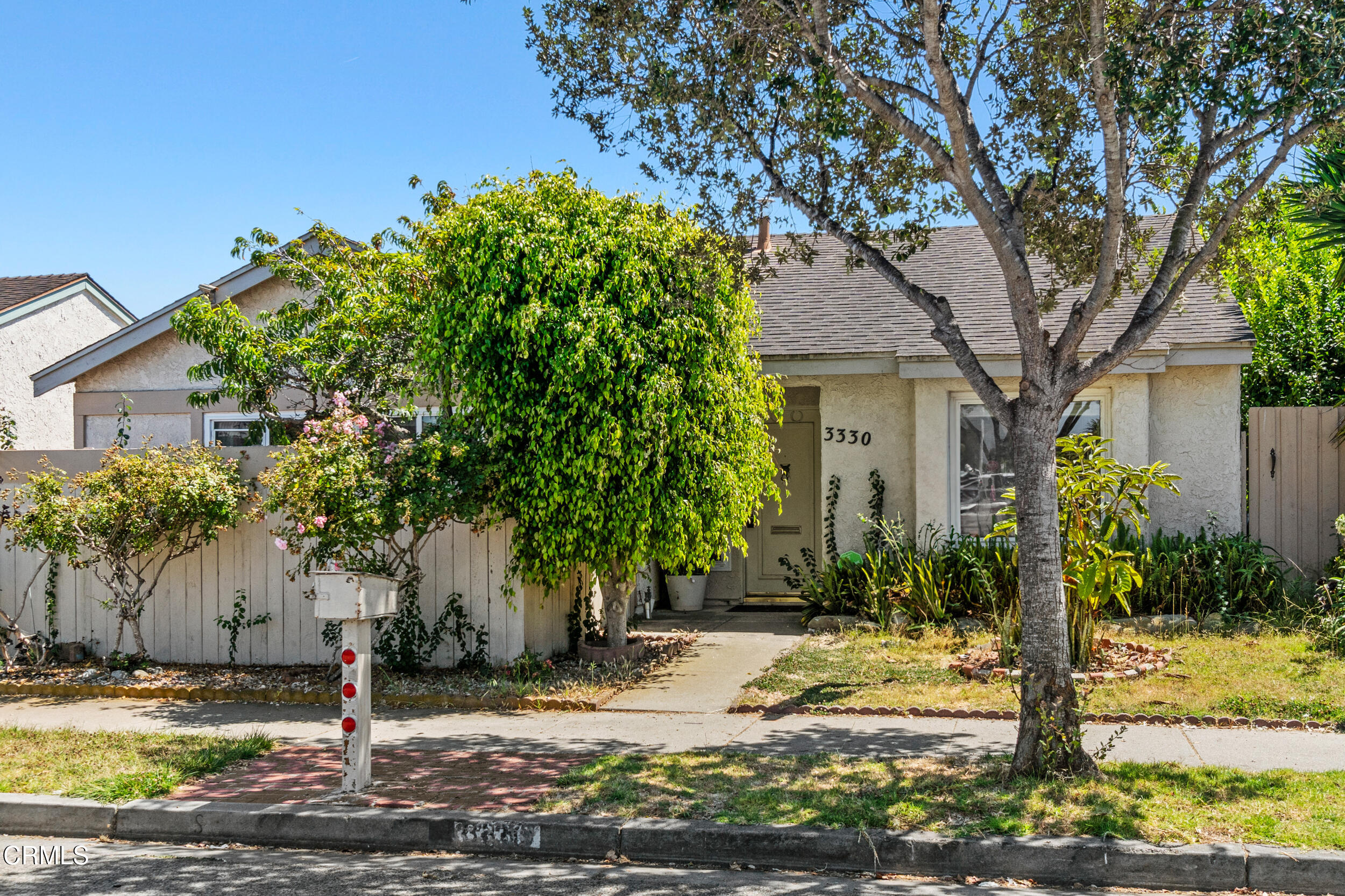 3330 Ketch Avenue Oxnard, CA 93035 - Photo 2 of 45 a front view of a house with garden