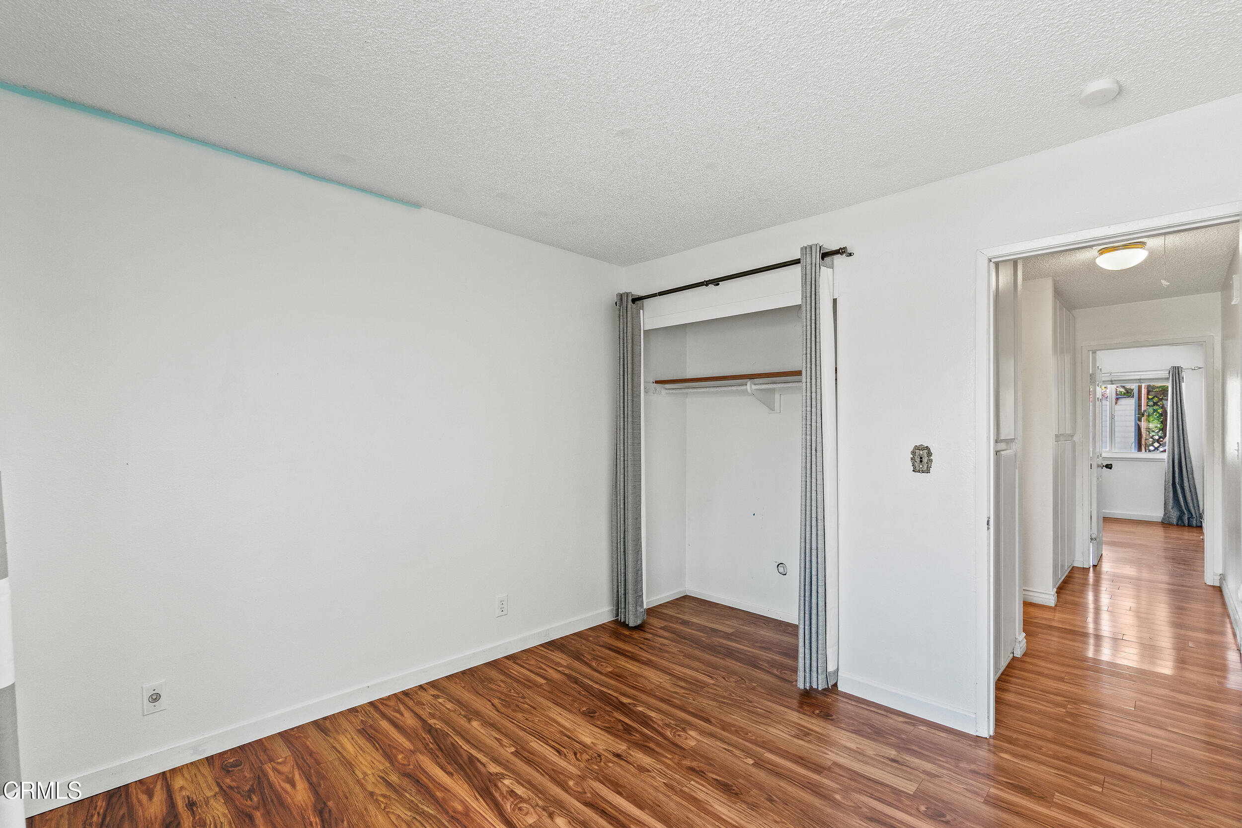 3330 Ketch Avenue Oxnard, CA 93035 - Photo 29 of 45 a view of a room with wooden floor