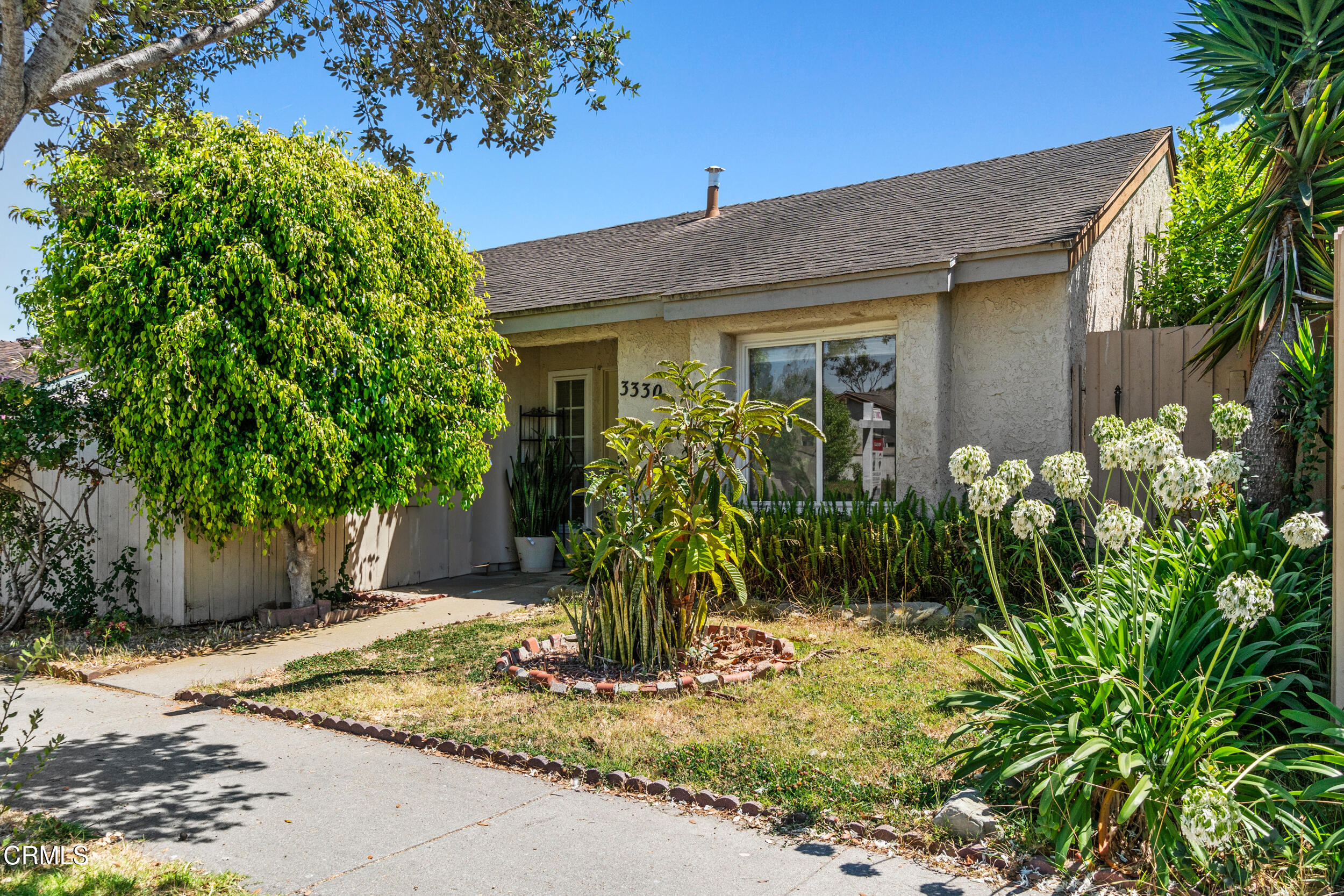 3330 Ketch Avenue Oxnard, CA 93035 - Photo 3 of 45 a view of a house with potted plants
