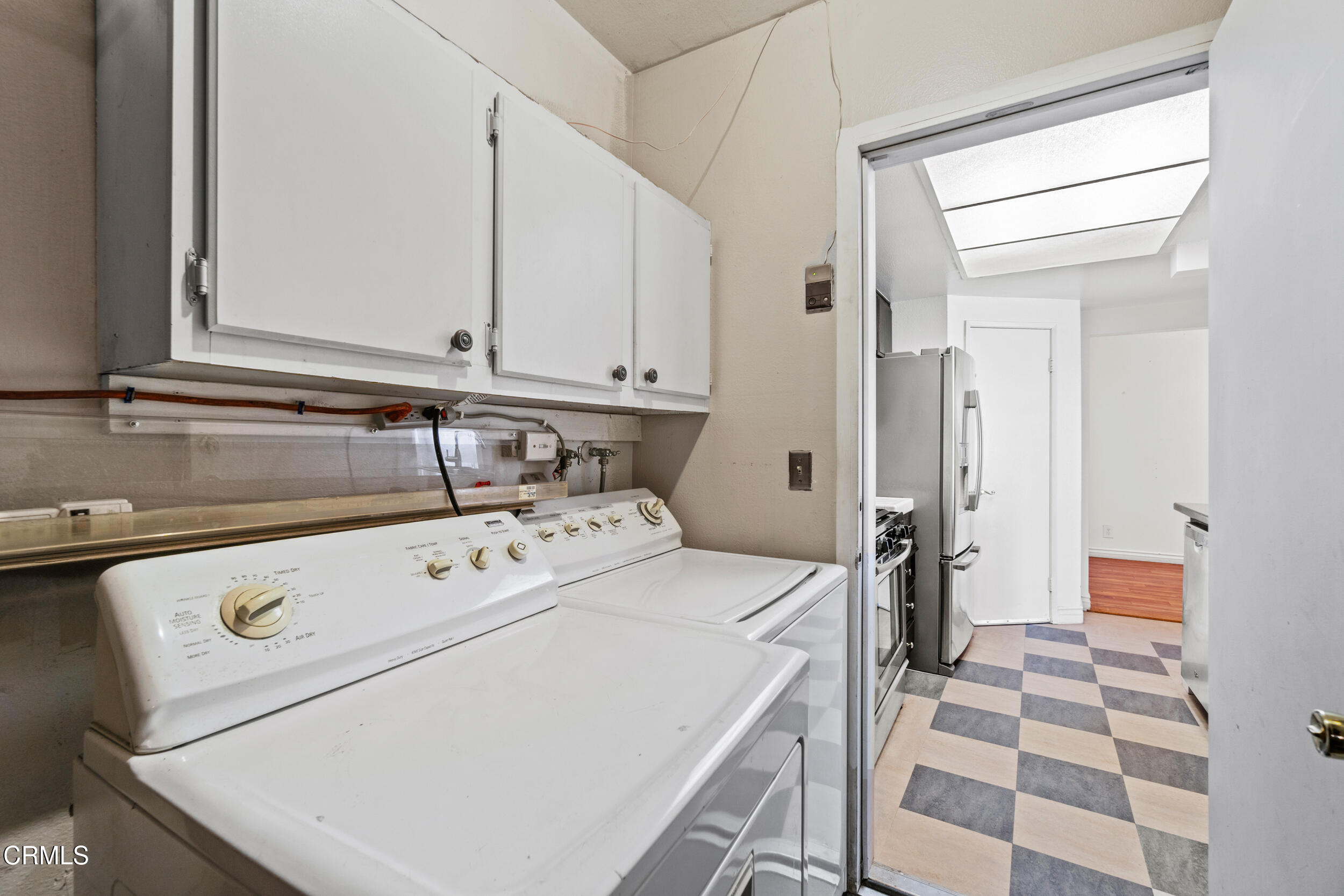 3330 Ketch Avenue Oxnard, CA 93035 - Photo 34 of 45 a utility room with dryer and washer