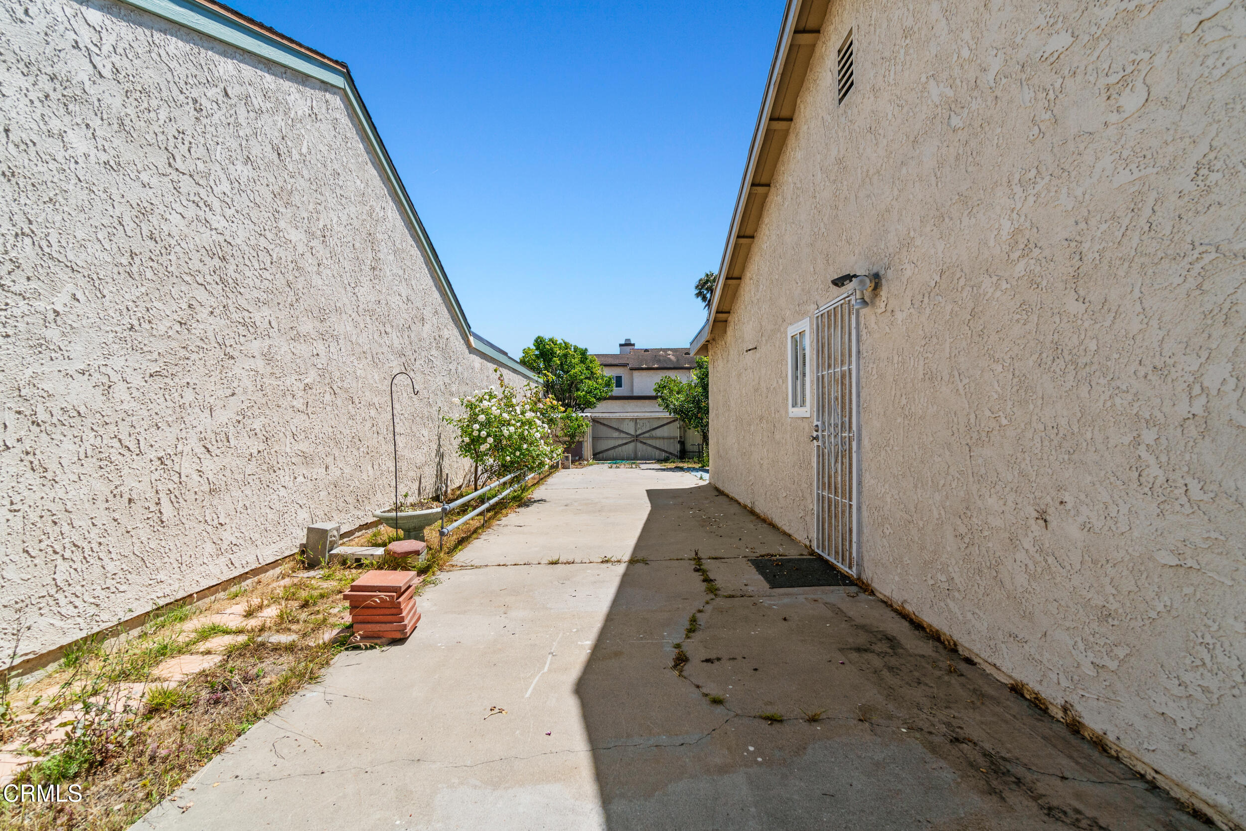 3330 Ketch Avenue Oxnard, CA 93035 - Photo 40 of 45 a view of a pathway along the wall