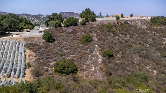a view of a town with mountains in the background