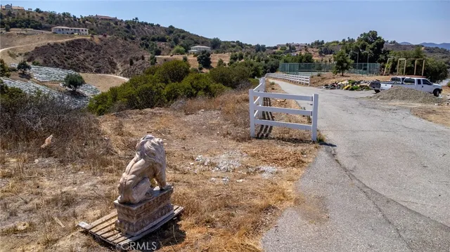 an aerial view of house with yard