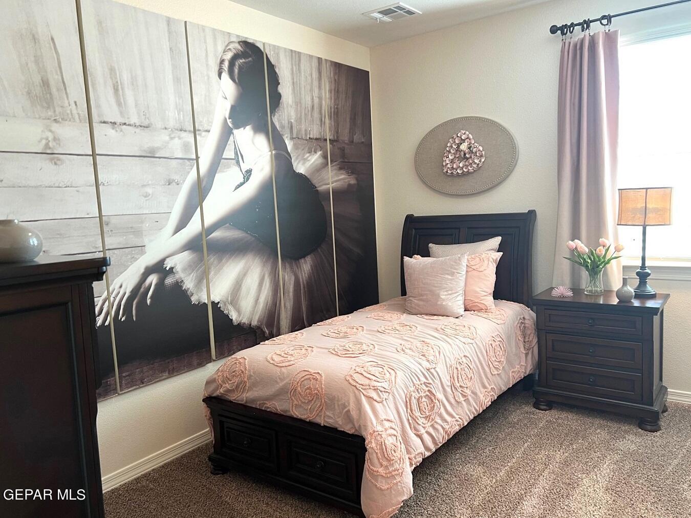 12869 Crystal Downs El Paso, TX 79928 - Photo 11 of 18 a bedroom with a bed and a window