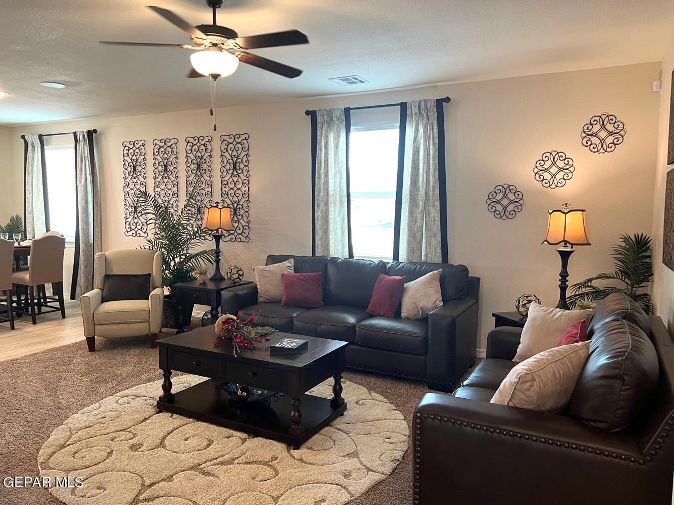 12869 Crystal Downs El Paso, TX 79928 - Photo 3 of 18 a living room with furniture and a large window