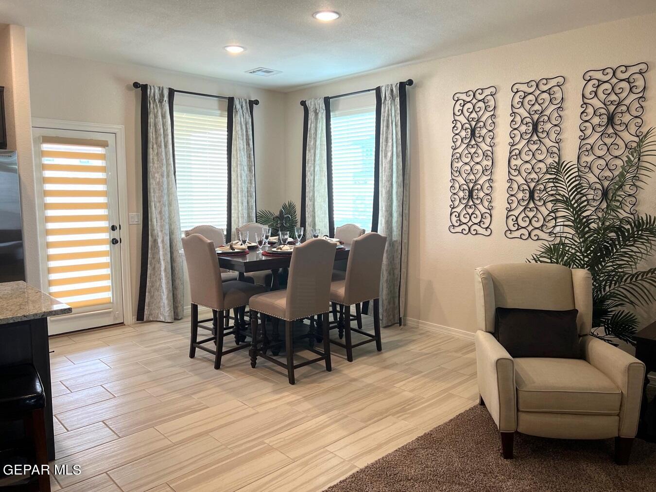 12869 Crystal Downs El Paso, TX 79928 - Photo 4 of 18 a view of a livingroom with furniture and wooden floor