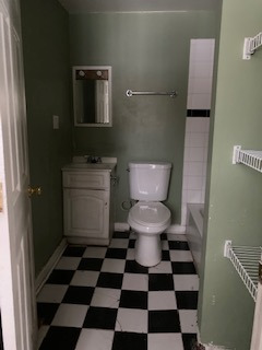 3213 Gideon Avenue Zion, IL 60099 - Photo 15 of 15 a bathroom with a black and white checkered floor
