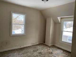 3213 Gideon Avenue Zion, IL 60099 - Photo 6 of 15 a view of an empty room with a window