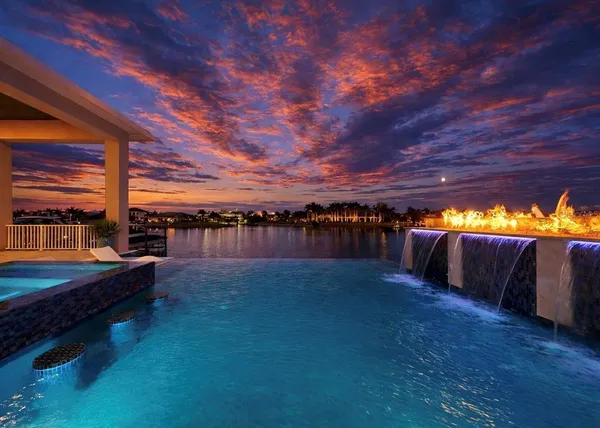 a view of a backyard of the house