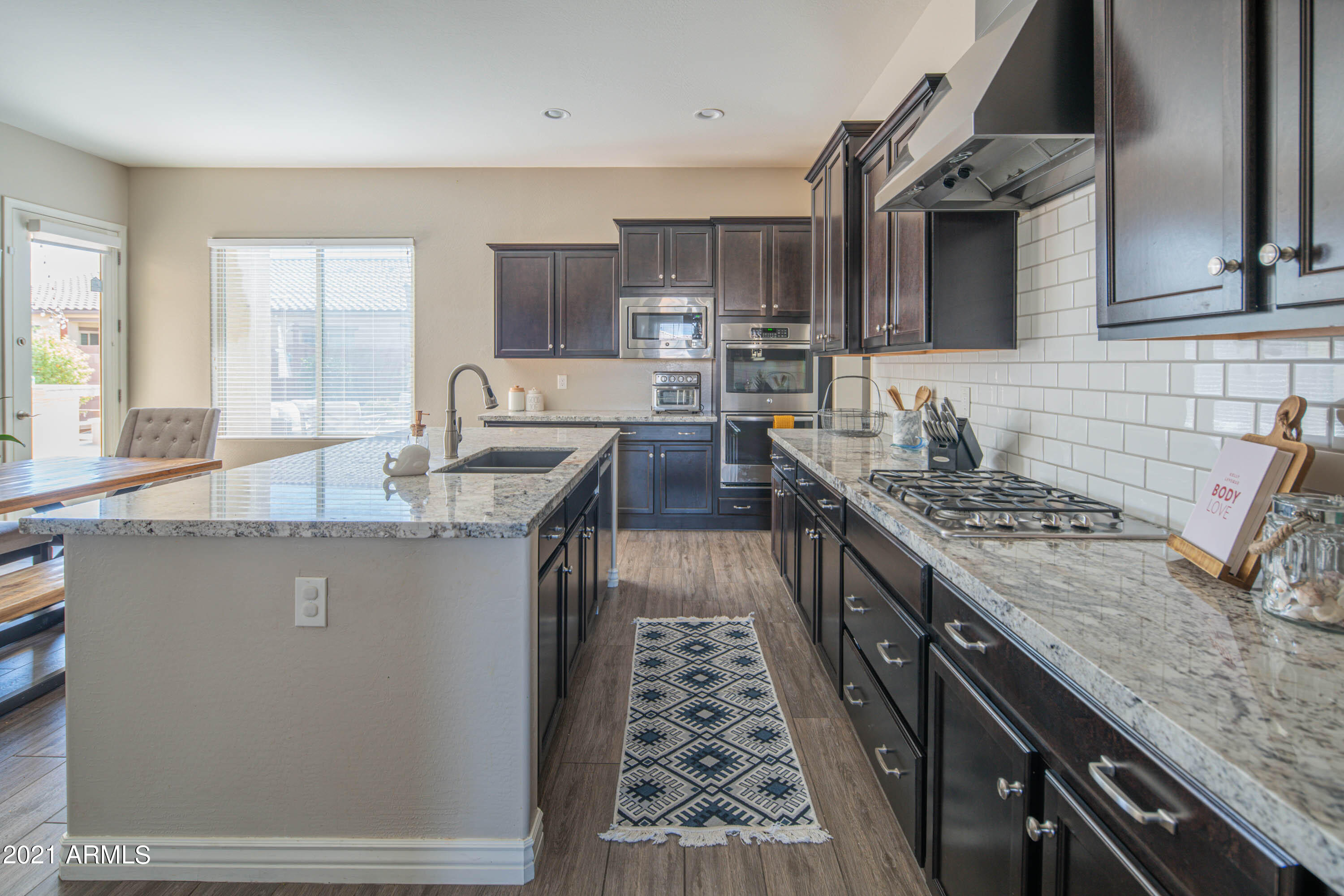 2655 East Stacey Road Gilbert, AZ 85298 - Photo 14 of 70 Gas Cook Top Opposite Kitchen Island