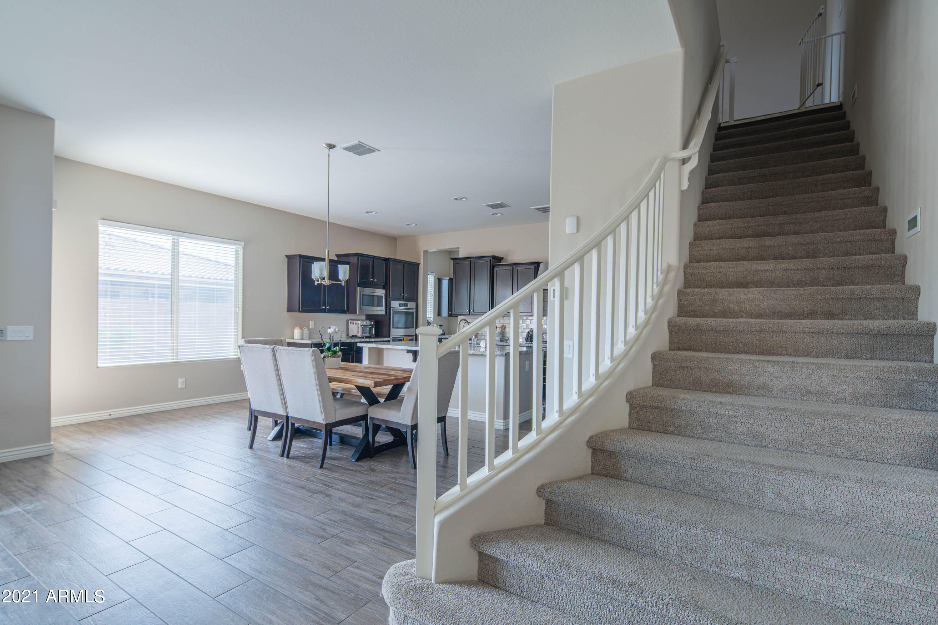 2655 East Stacey Road Gilbert, AZ 85298 - Photo 27 of 70 Grand Staircase with White Banister