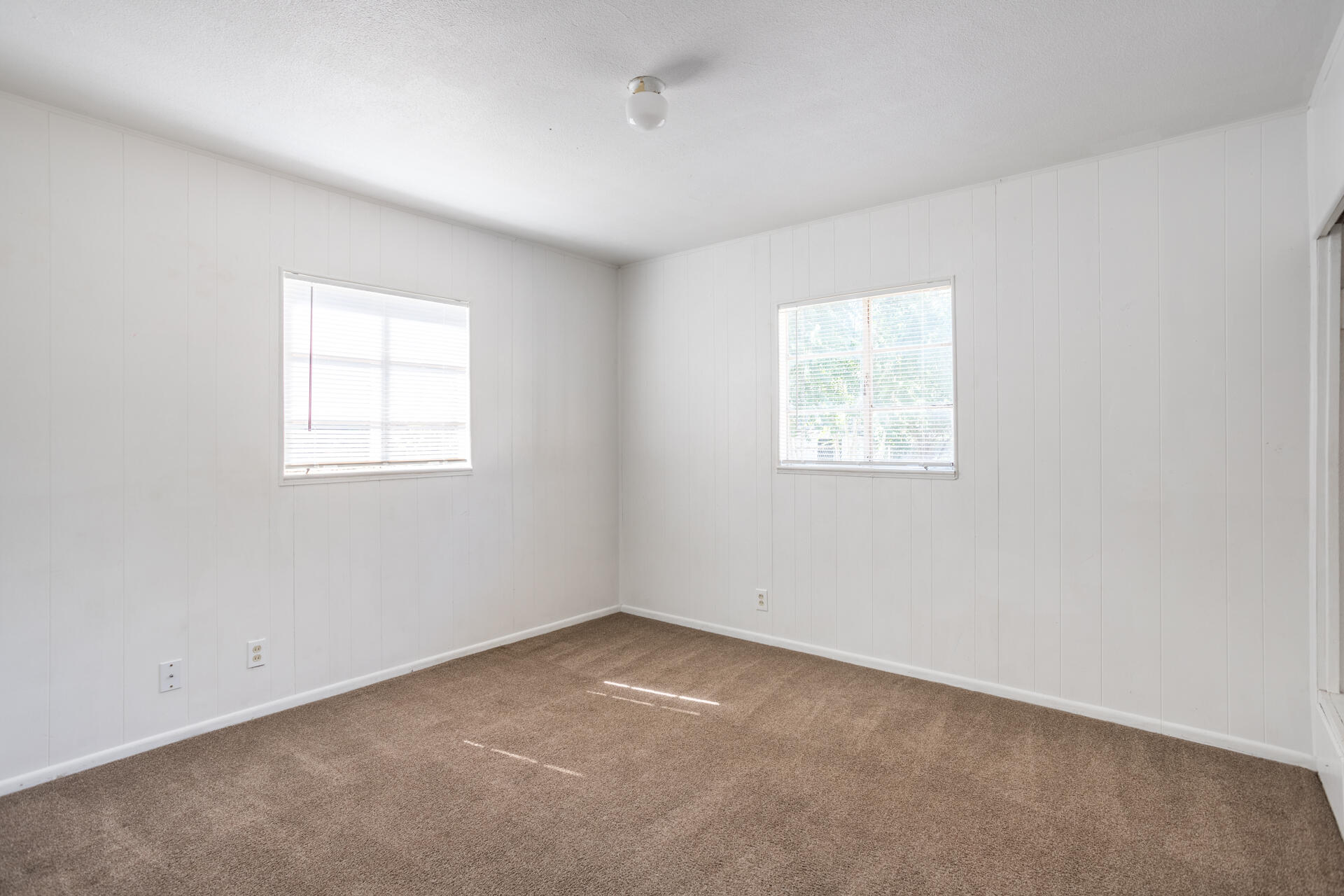 1105 5th Street Redding, CA 96002 - Photo 7 of 11 an empty room with a window