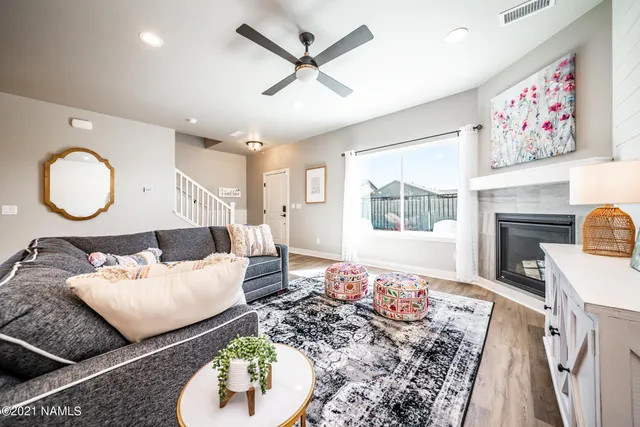 a kitchen with stainless steel appliances granite countertop a refrigerator stove a sink and a microwave