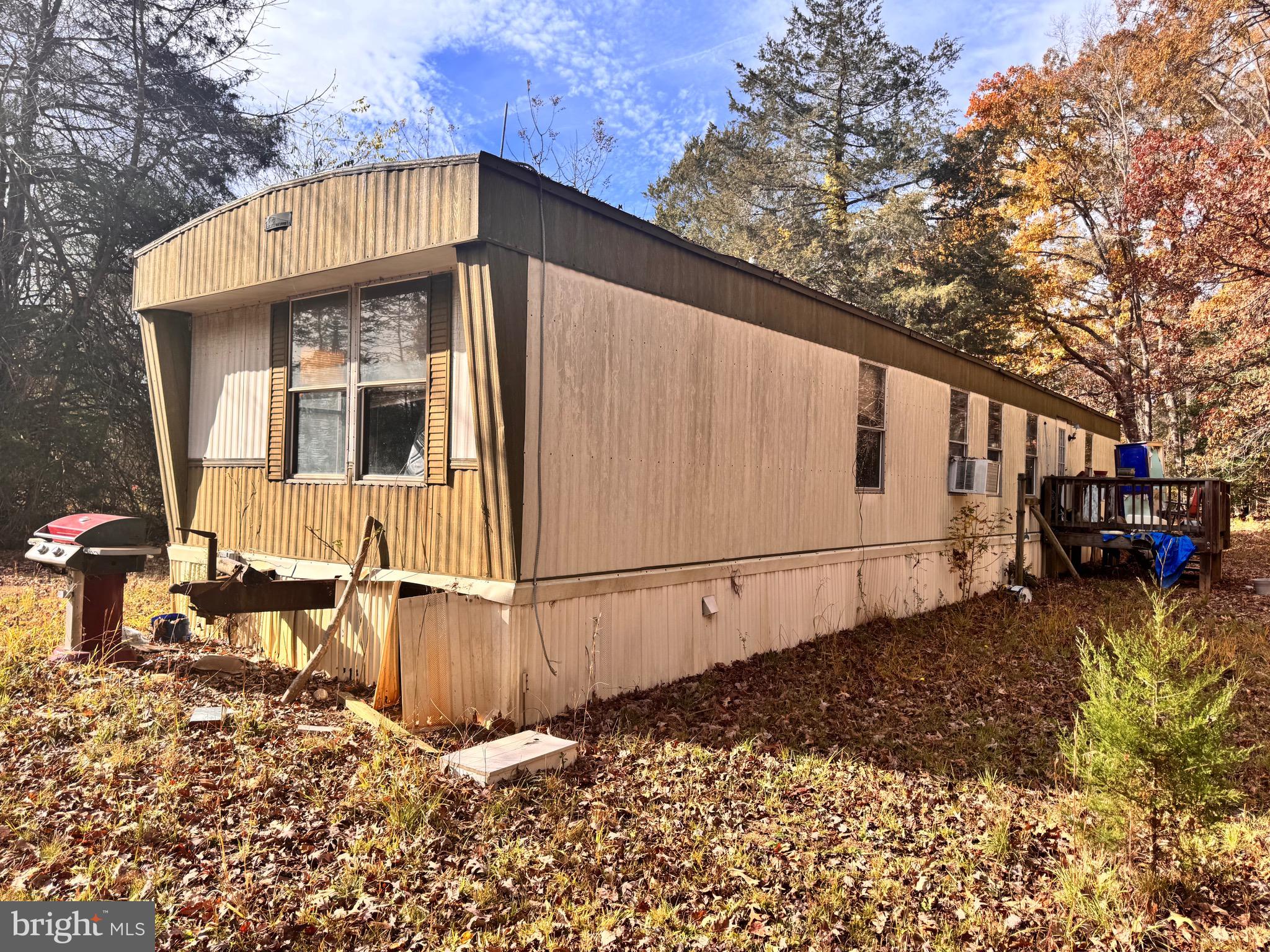 432 Little River Farms Road Bumpass, VA 23024 - Photo 9 of 17 a front view of a house with a yard