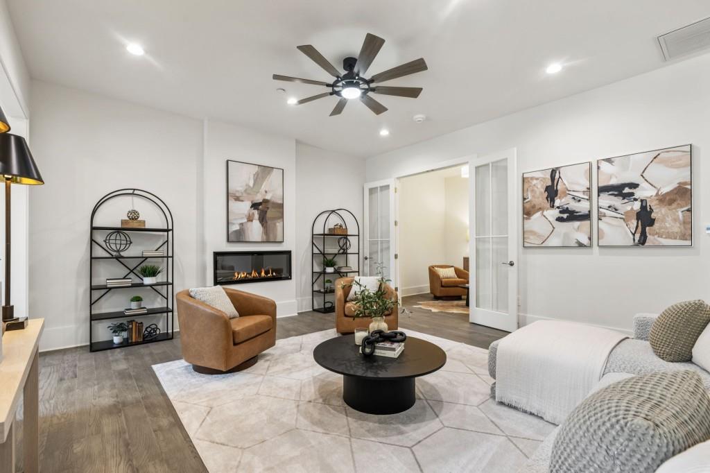 12455 Broadwell Road, Unit 201 Milton, GA 30004 - Photo 11 of 38 a living room with furniture and a window
