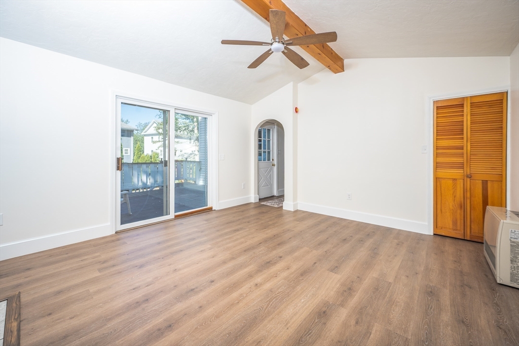 10 Weston Street Milton, MA 02186 - Photo 14 of 35 wooden floor in an empty room with a window