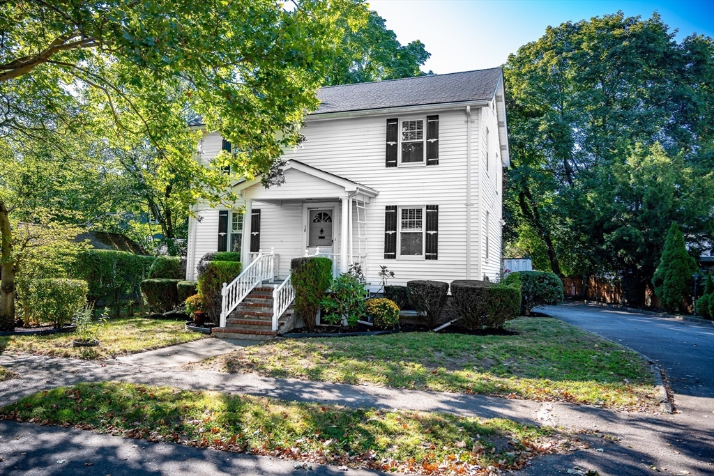 10 Weston Street Milton, MA 02186 - Photo 3 of 35 a front view of a house with a yard