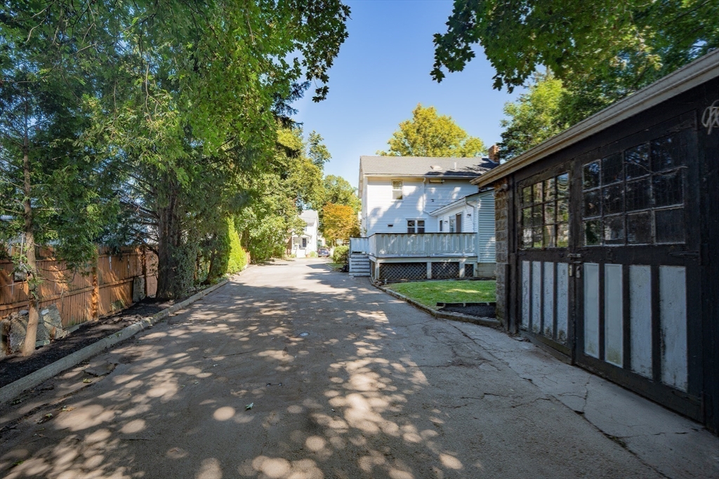 10 Weston Street Milton, MA 02186 - Photo 31 of 35 a view of street along with trees