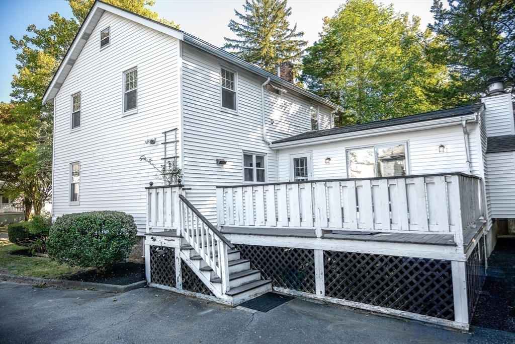 10 Weston Street Milton, MA 02186 - Photo 5 of 35 a view of a house with a deck