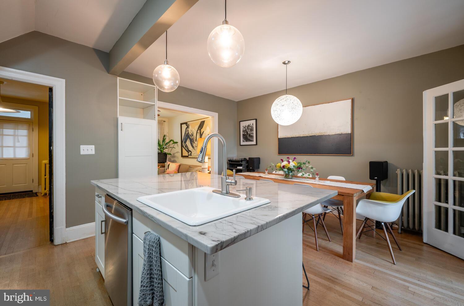 1220 Orren Street Northeast Washington, DC 20002 - Photo 12 of 37 Modern kitchen with stylish lighting accents.