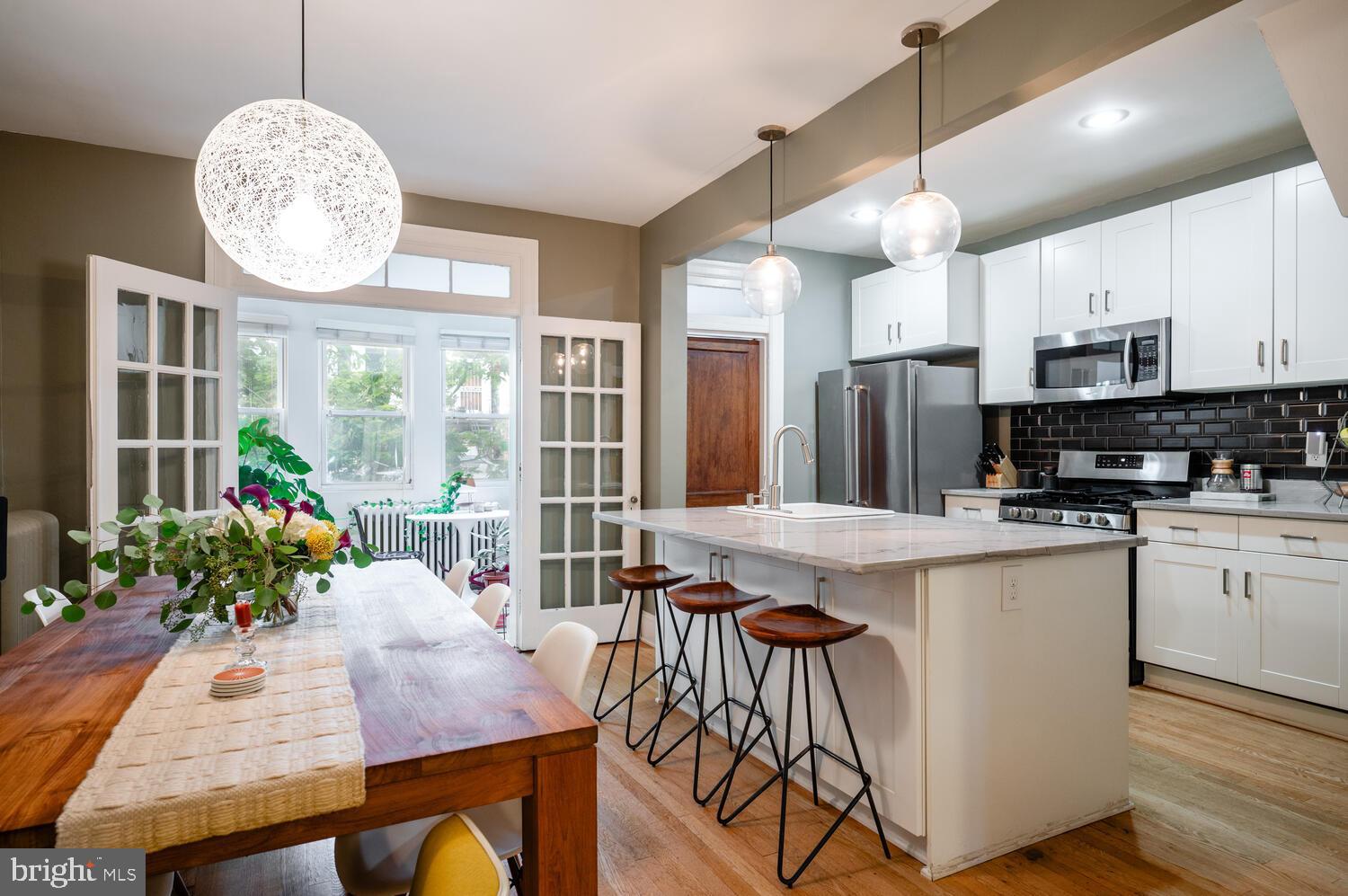 1220 Orren Street Northeast Washington, DC 20002 - Photo 14 of 37 Bright, inviting kitchen with modern charm.