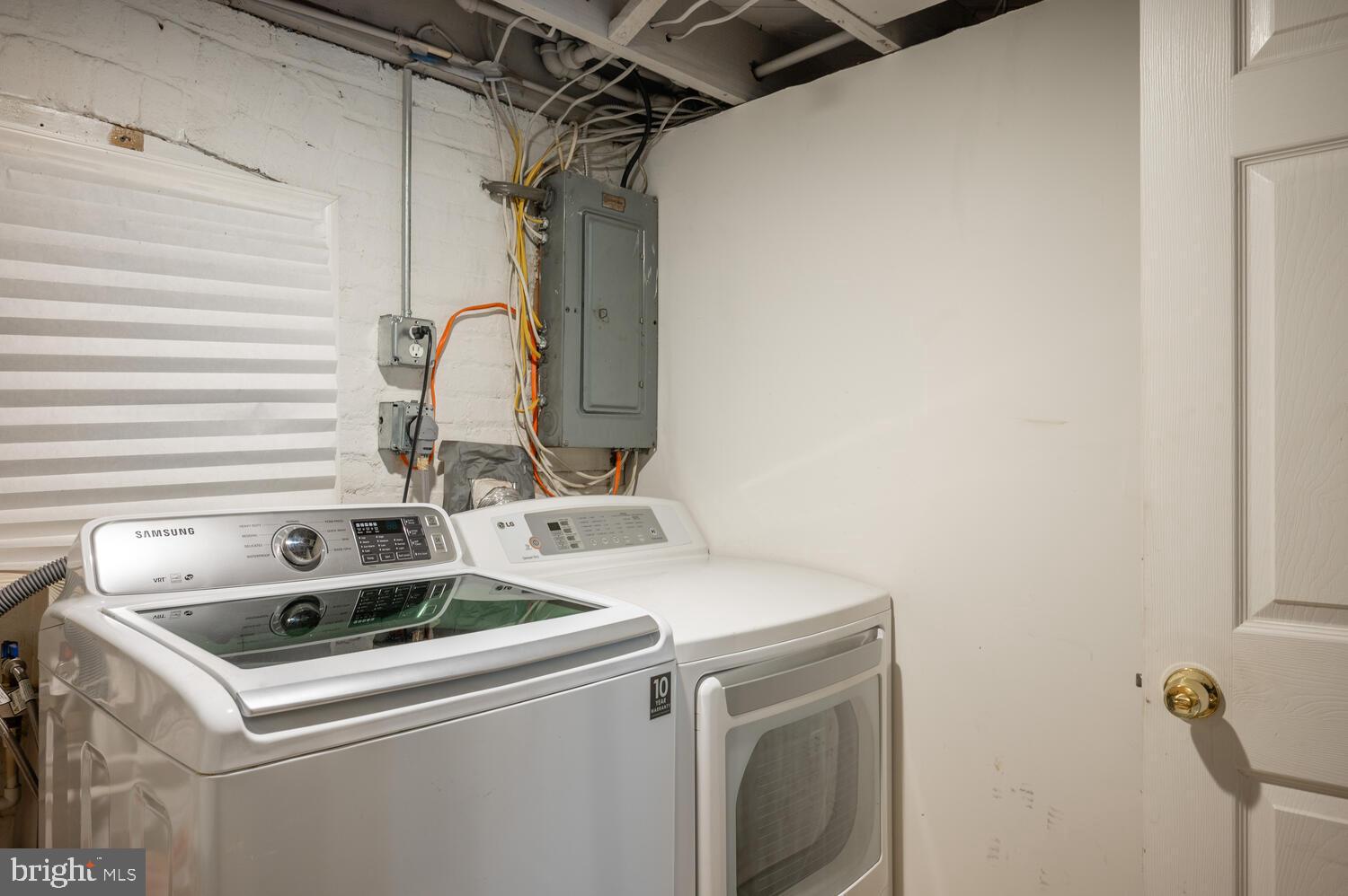 1220 Orren Street Northeast Washington, DC 20002 - Photo 29 of 37 Functional laundry space with modern appliances.