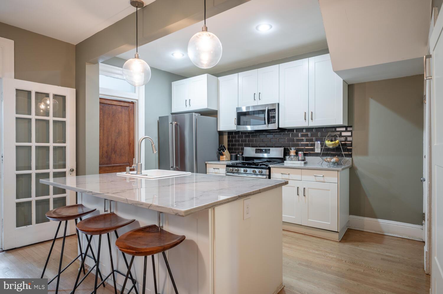 1220 Orren Street Northeast Washington, DC 20002 - Photo 10 of 37 Modern kitchen with sleek finishes.