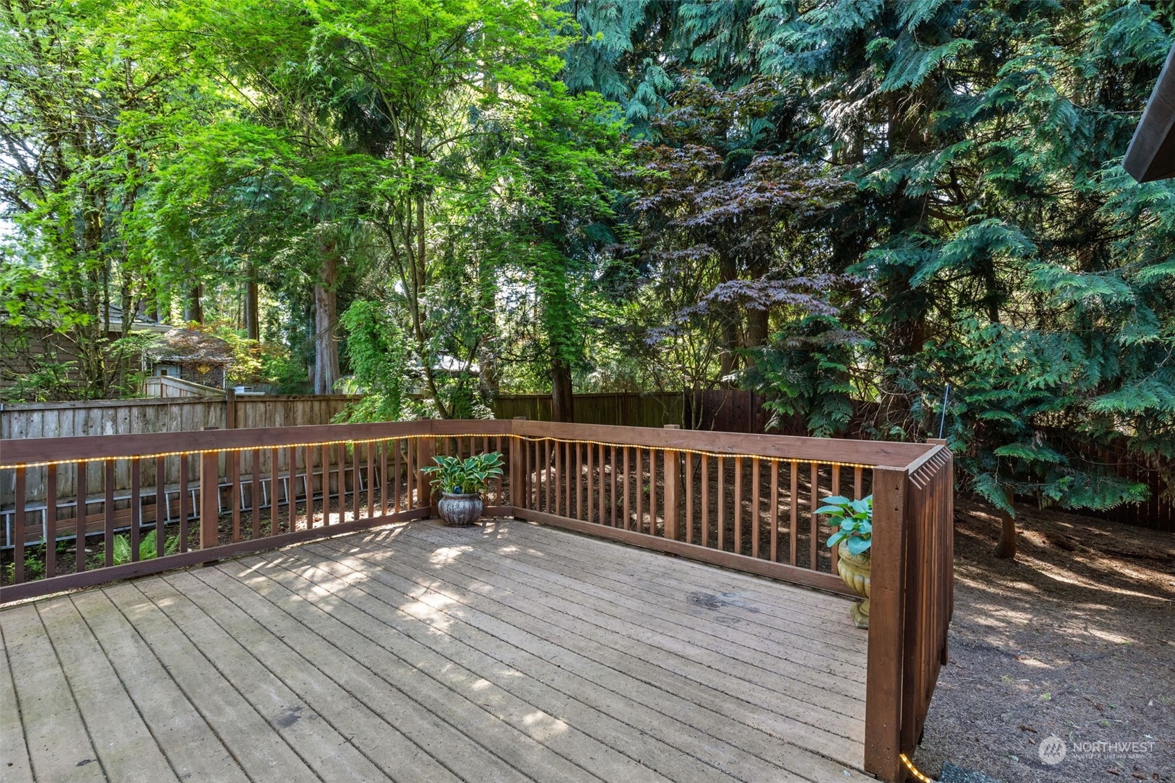 2330 243rd Place Southeast Bothell, WA 98021 - Photo 19 of 40 a view of deck with wooden floor and outdoor seating