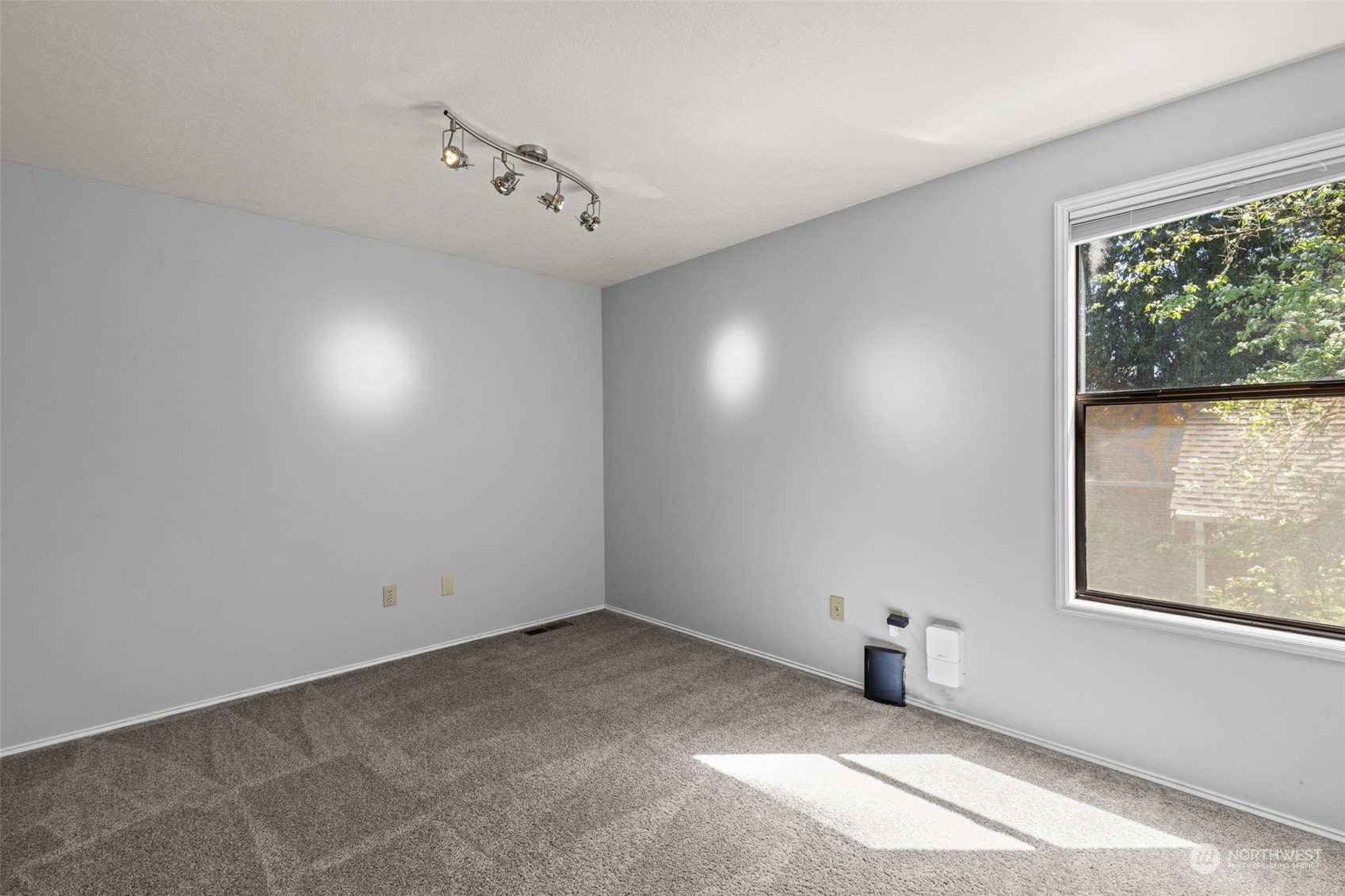 2330 243rd Place Southeast Bothell, WA 98021 - Photo 30 of 40 an empty room with windows