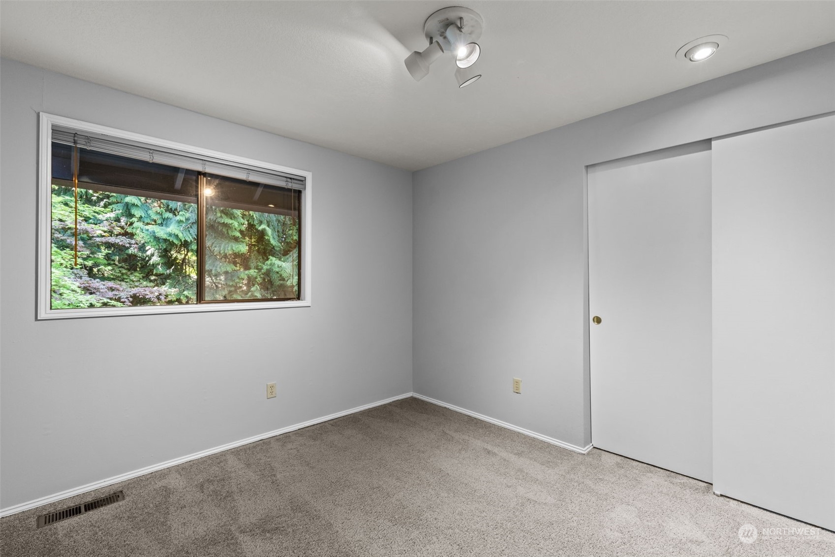 2330 243rd Place Southeast Bothell, WA 98021 - Photo 31 of 40 an empty room with a window